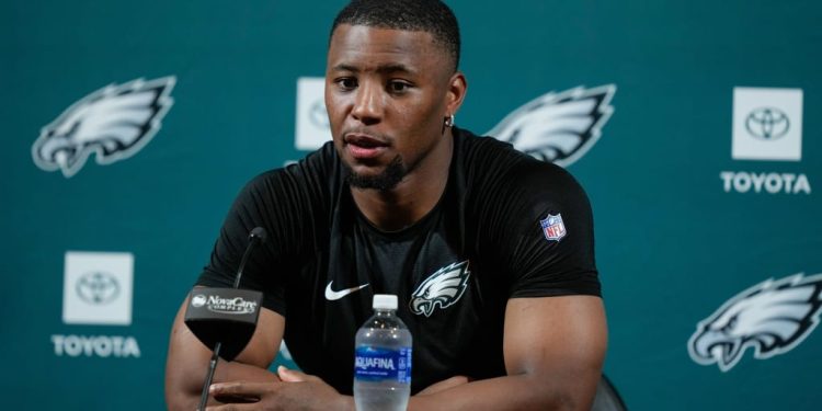 Barkley Breaks Rushing Record in NFL History